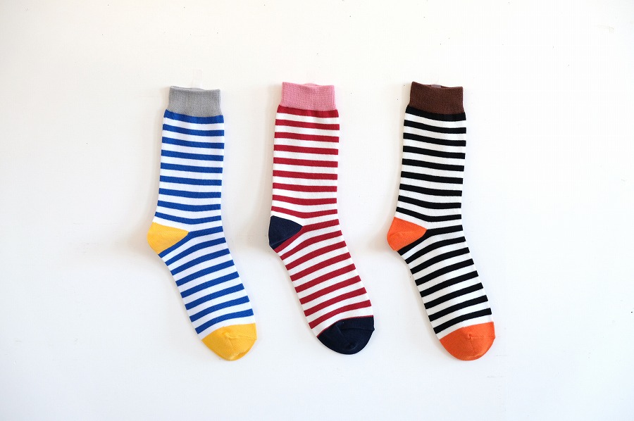 よこしましまくつした